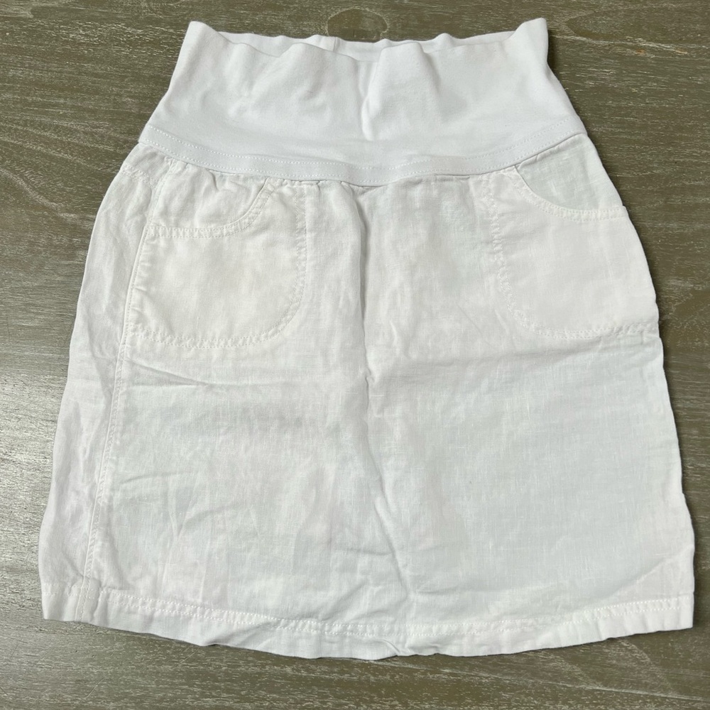 Athleta brand white linen fold over mini skirt with pockets. Size 6.